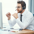 Shot of a call centre agent working in an office