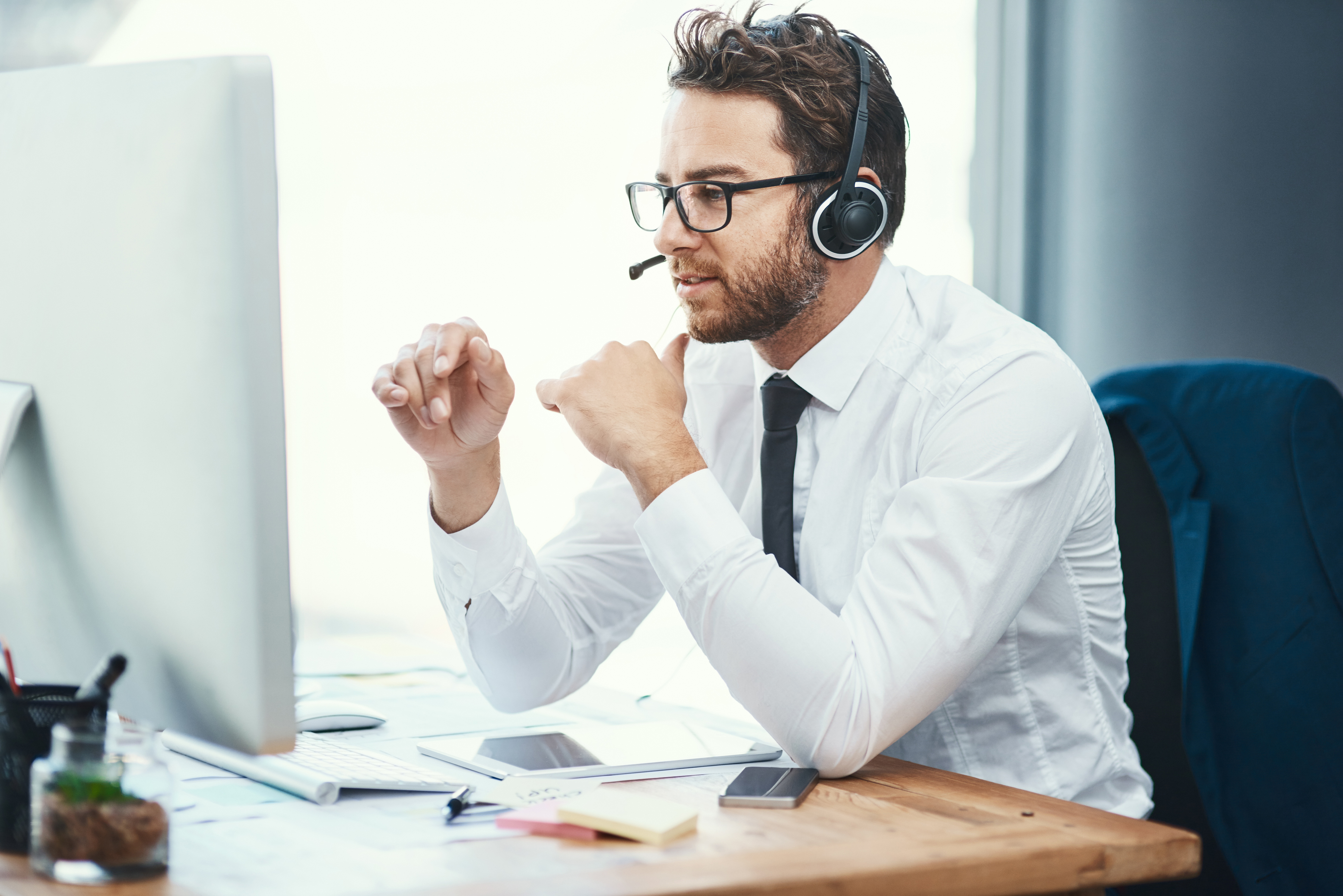 Shot of a call centre agent working in an office