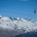 BOURG-SAINT-MAURICE, FRANCE - APRIL 07: a man walking on a highline in the French Alps, Auvergne-Rhône-Alpes, Bourg-Saint-Maurice, France on April 07, 2017 in Bourg-Saint-Maurice, France.